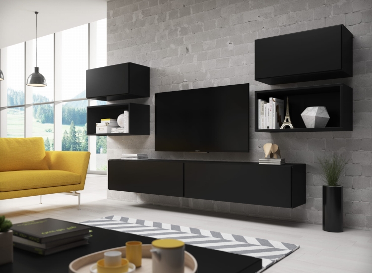 Zestaw ROCO 3 jako funkcjonalna aranżacja ściany z miejscem na telewizor i dodatki.