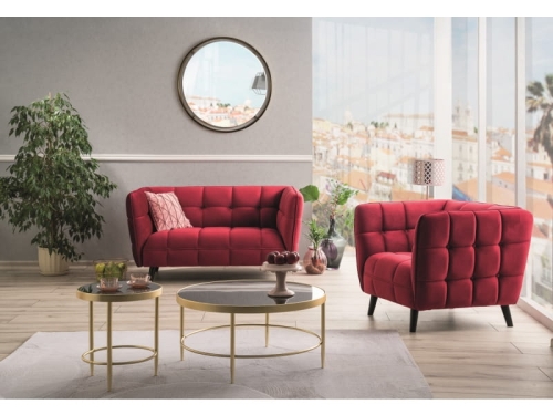 Stylowy fotel do salonu bordowy CASTELLO z grubym wypełnieniem i stabilną konstrukcją, który wyróżnia wnętrze.