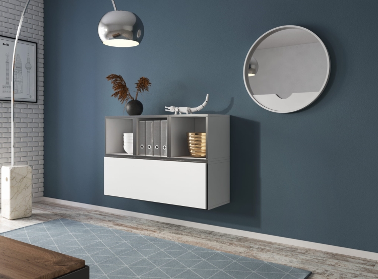 Minimalistyczny zestaw do salonu z półkami i frontem w dekorze drewna.