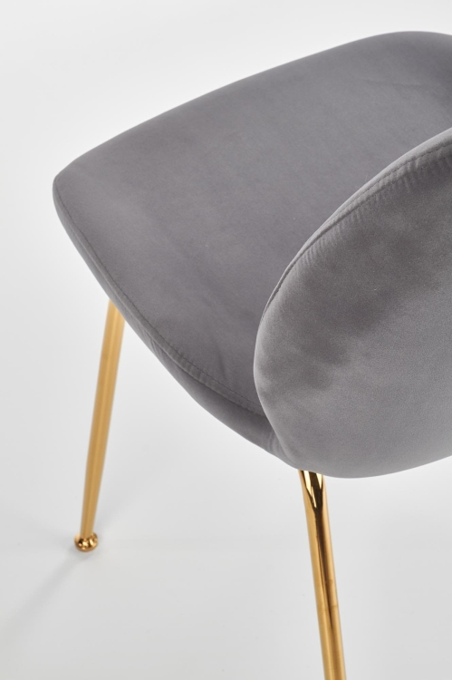 Krzesło welurowe szare z nowoczesną metalową konstrukcją.