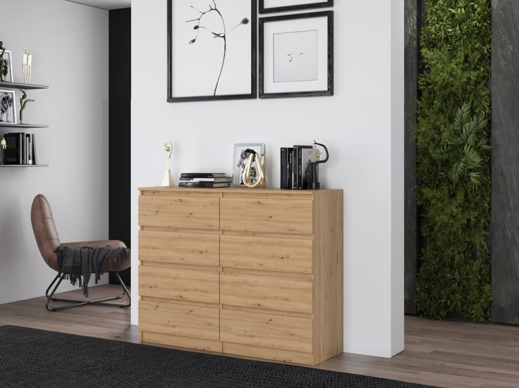 Komoda dąb artisan 120 cm posiada osiem szuflad, dużą pojemność i nowoczesny wygląd bez uchwytów.