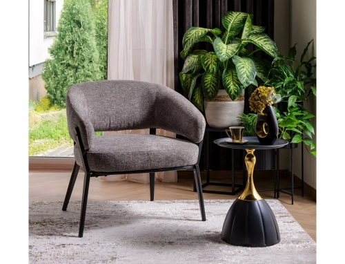 Stolik kawowy czarny złoty wyróżnia się luksusowym wyglądem i solidnym wykonaniem, doskonale pasując do eleganckiego salonu.