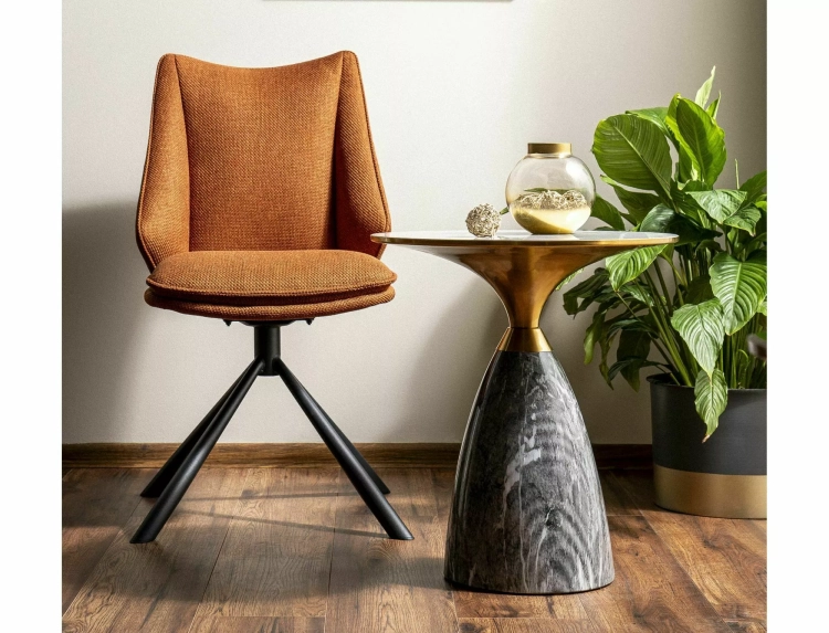 Stolik do salonu okrągły z ceramicznym blatem i dekoracyjną podstawą w stylu glamour.