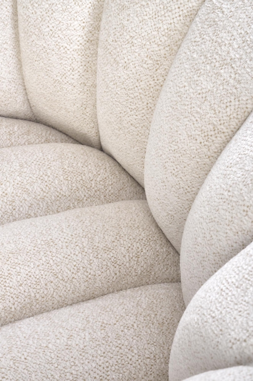 Fotel do salonu FRASER obrotowy 360 stopni, w kolorze kremowym, nowoczesny i funkcjonalny, doskonały do relaksu.